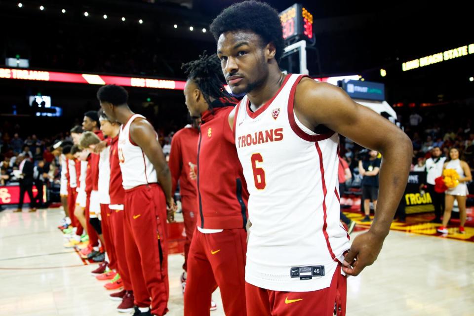 USC guard Bronny James stands for the national anthem before playing against Long Beach State.