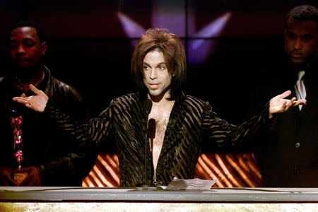 "The Artist" formerly known as Prince gives his acceptance speech after being named Male Artist of the Decade at the 14th annual Soul Train Music Awards March 4, 2000. REUTERS/Gary Hershorn