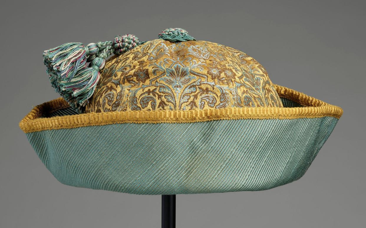 The gold brocade and turquoise hat worn by Princess Elizabeth to play 'Aladdin' in 1943 - Royal Collection Trust/© Her Majesty Queen Elizabeth II 2021