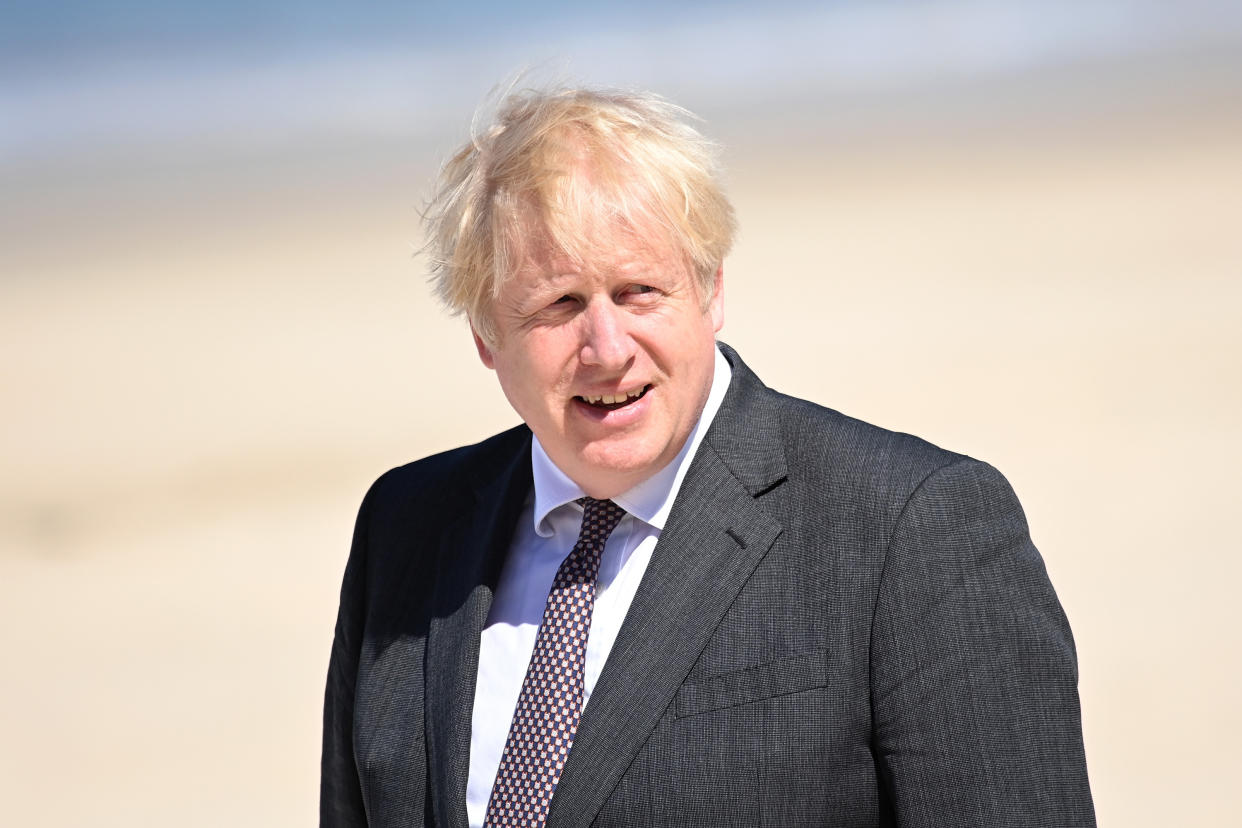 Prime Minister Boris Johnson waits for arrivals during an official welcome of guests, during the G7 summit in Cornwall. Picture date: Saturday June 12, 2021.