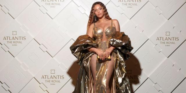 Beyoncé Stuns in Shimmering Gold Naked Dress with X-Shaped Nipple Pasties