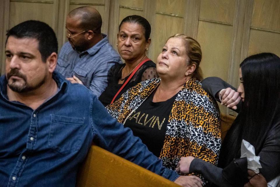 The fiancée of Juan Ricardo Hernandez, Mercedes Arce, second from right, surrounded by family and friends, reacts to the guilty of manslaughter verdict delivered by the jury in the Pablo Lyle trial in Miami on Oct. 4, 2022. Lyle was accused of killing 63-year-old Juan Ricardo Hernandez during a road rage incident in 2019.