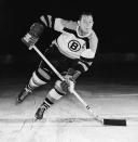 <p>Canadian professional hockey player Milt Schmidt of the Boston Bruins skates on the ice, md 20th Century. (Photo by Bruce Bennett Studios/Getty Images) </p>