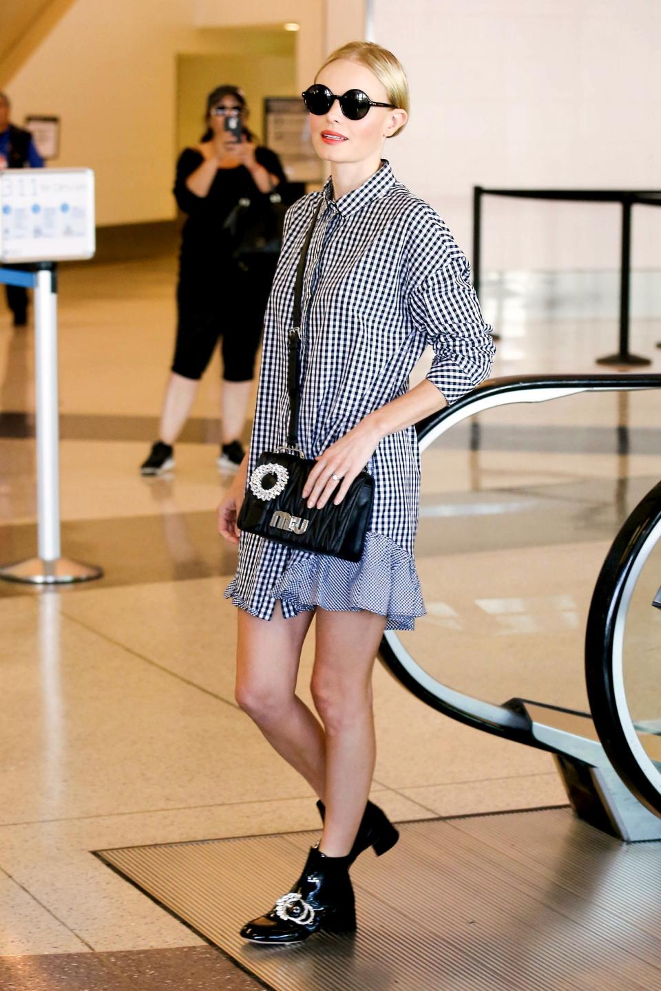 The quickest way to toughen up a sweet shirtdress while you're on the go: heavy-metal accessories, like Kate Bosworth's buckled crossbody bag and boots.