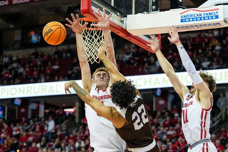Wisconsin's Tyler Wahl forces Lehigh's Tyler Whitney-Sidney to dish the ball  off underneath the basket during the first half Thursday.
