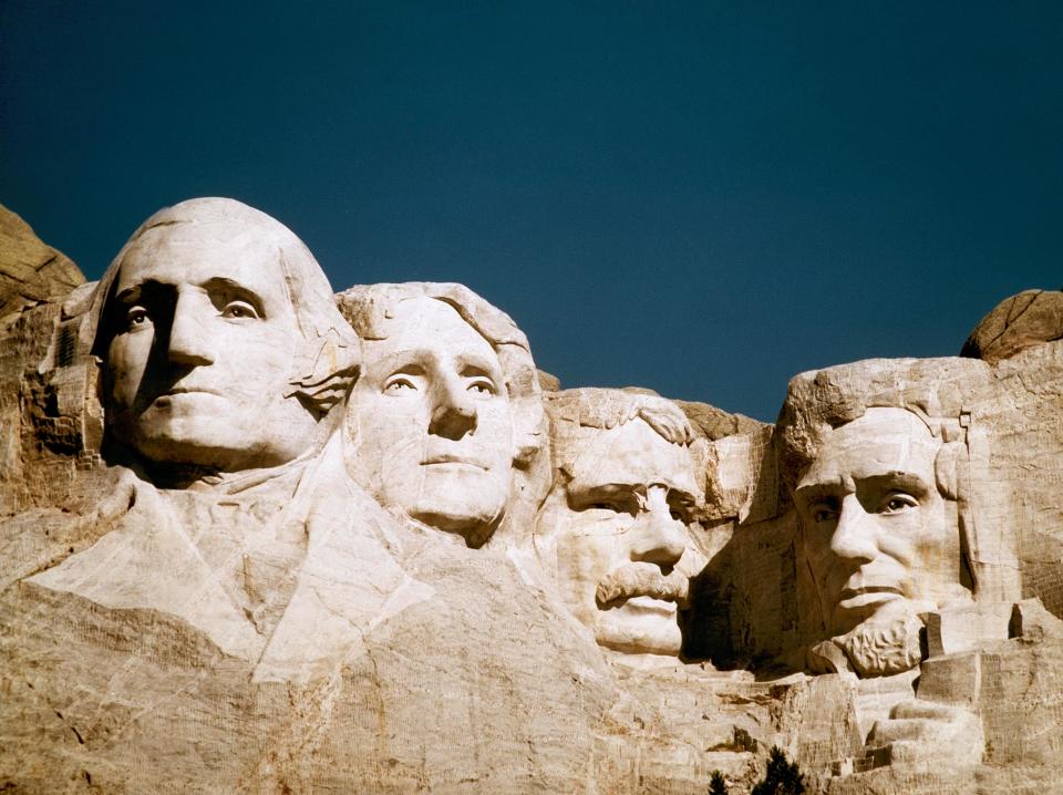 George Washington and Abraham Lincoln flank Thomas Jefferson and Teddy Roosevelt at Mount Rushmore in South Dakota.