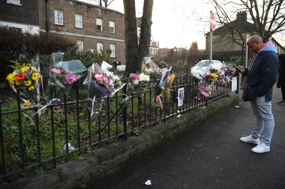 Flowers have been left at the scene of the collision (PA)