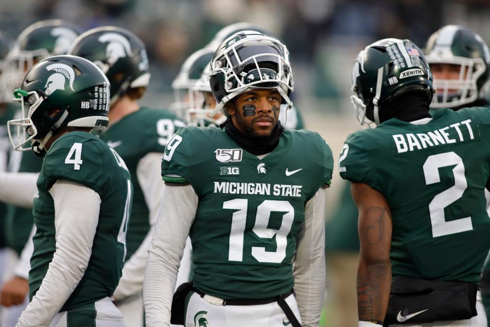 Michigan State's Josh Butler warms up before a game against Maryland, Nov. 30, 2019, in East Lansing.