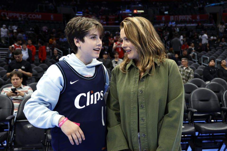 LOS ANGELES, CALIFORNIA - NOVEMBER 17: Alicia Silverstone and her son, Bear Blu, attend a basketball game between the Los Angeles Clippers and Houston Rockets at Crypto.com Arena on November 17, 2023 in Los Angeles, California. NOTE TO USER: User expressly acknowledges and agrees that, by downloading and or using this photograph, User is consenting to the terms and conditions of the Getty Images License Agreement. (Photo by Kevork Djansezian/Getty Images)