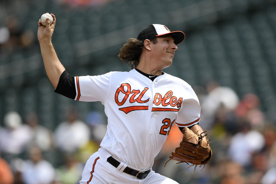 Baltimore Orioles starter Asher Wojciechowski delivers a pitch during the first inning of a baseball game against the Houston Astros, Sunday, Aug. 11, 2019, in Baltimore. (AP Photo/Nick Wass)