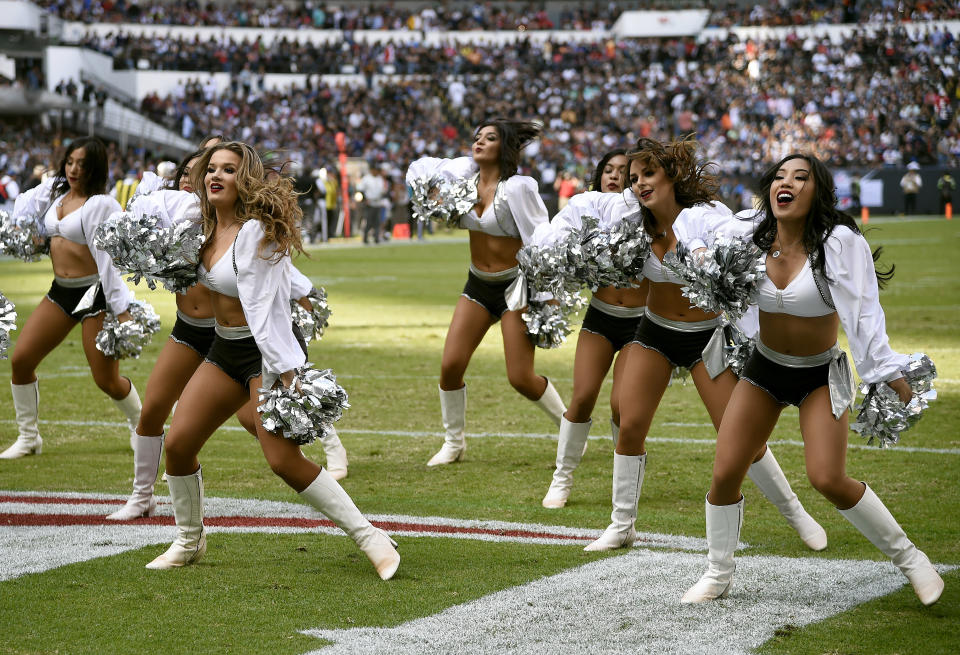 <p>Oakland Raiders´ cheerleaders perform during the 2016 NFL week 11 regular season football game against New England Patriots’ on November 19, 2017 at the Azteca Stadium in Mexico City. / AFP PHOTO / ALFREDO ESTRELLA (Photo credit should read ALFREDO ESTRELLA/AFP/Getty Images) </p>