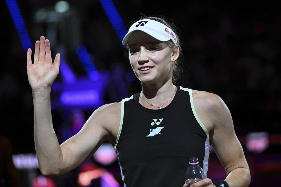 Kazakhstan's Elena Rybakina thanks the fans after winning the Women Singles tennis tournament of Stuttgart, Germany, Sunday April 21, 2024. (Marijan Murat/dpa via AP)