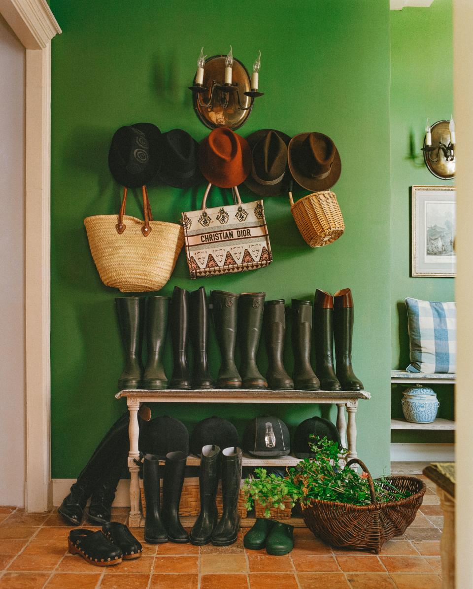 Wellies lined up in the mudroom.