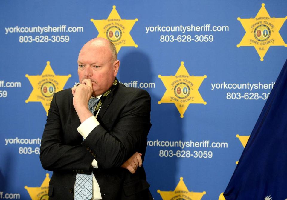 Sheriff Kevin R. Tolson of York County, SC listens as the 911 calls are replayed during a press conference on Thursday, April 8, 2021. Former NFL player Phillip Adams shot 6 people, killing five and severely wounding another man on Wednesday, April 7, 2021 in York County. Adams then killed himself.