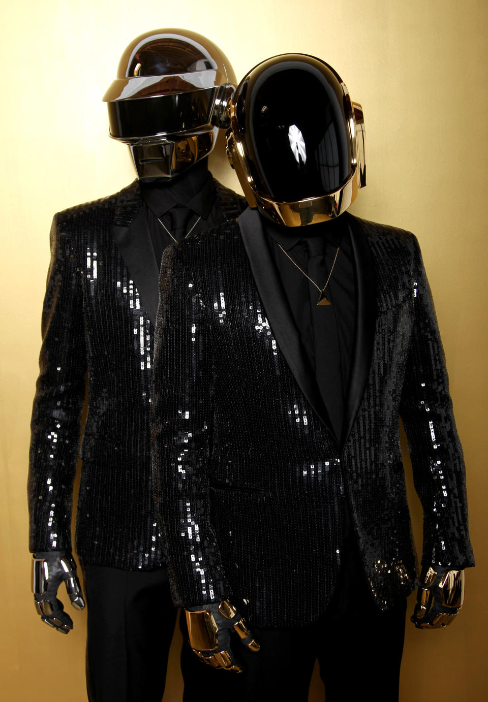 In this April 17, 2013 photo, Thomas Bangalter, left, and Guy-Manuel de Homem-Christo, from the music group, Daft Punk, pose for a portrait in Los Angeles. The electronic duo's new studio album, "Random Access Memories" releases in the US on May 21. (Photo by Matt Sayles/Invision/AP)