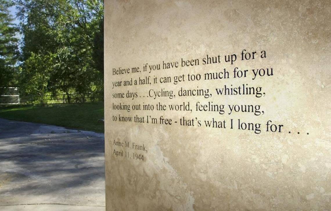 A quote from Anne Frank dated April 11, 1944, is shown on a stone wall at the bottom of a set of concrete steps at the Boise memorial.