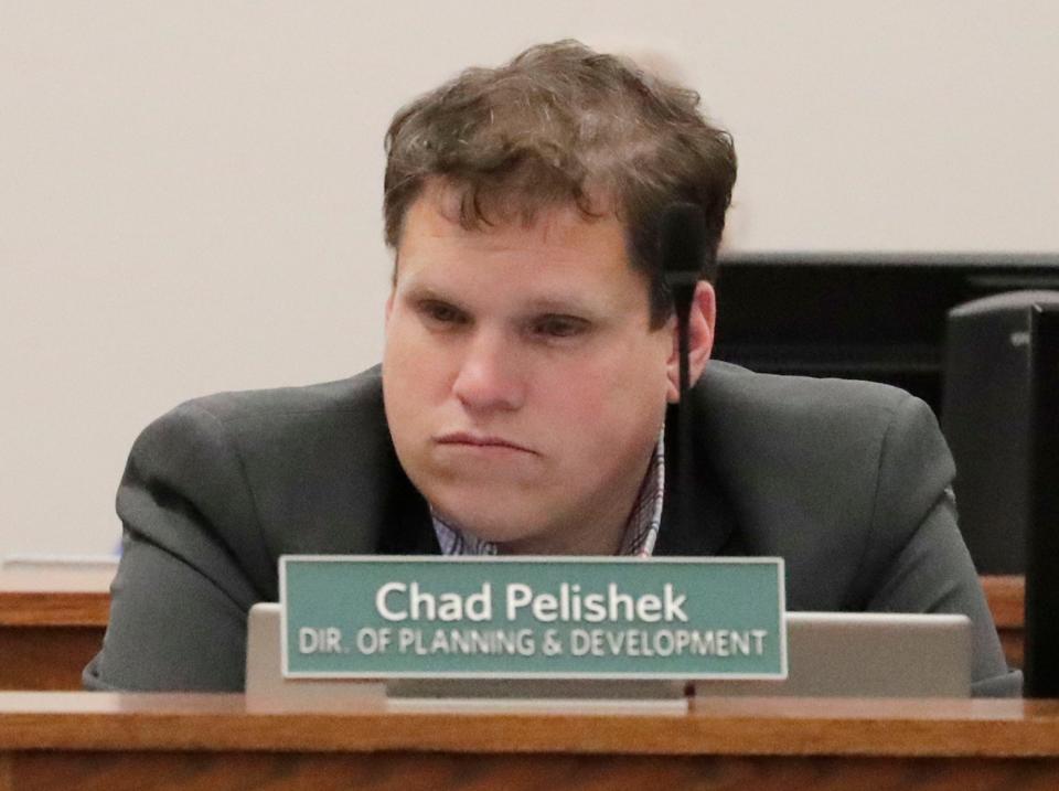 Director of Planning & Development Sustainability Coordinator Chad Pelishek waits for the meeting to start at Sheboygan City Hall, Monday, January 9, 2022, in Sheboygan, Wis.