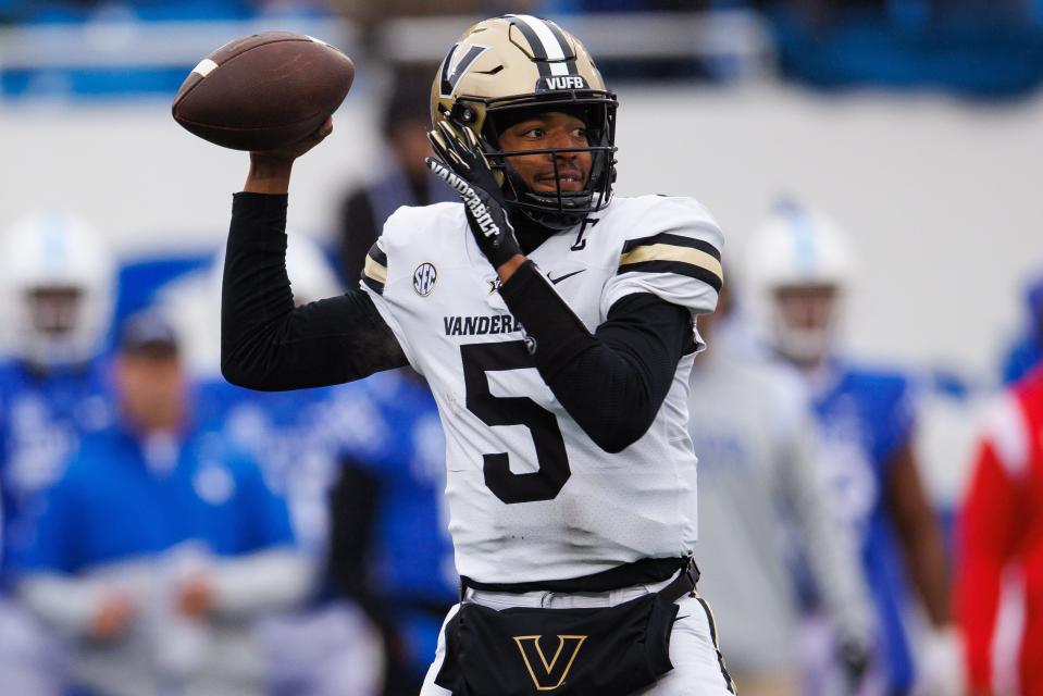 Nov 12, 2022; Lexington, Kentucky, USA; Vanderbilt Commodores quarterback Mike Wright (5) throws a pass during the first quarter against the Kentucky Wildcats at Kroger Field. Mandatory Credit: Jordan Prather-USA TODAY Sports