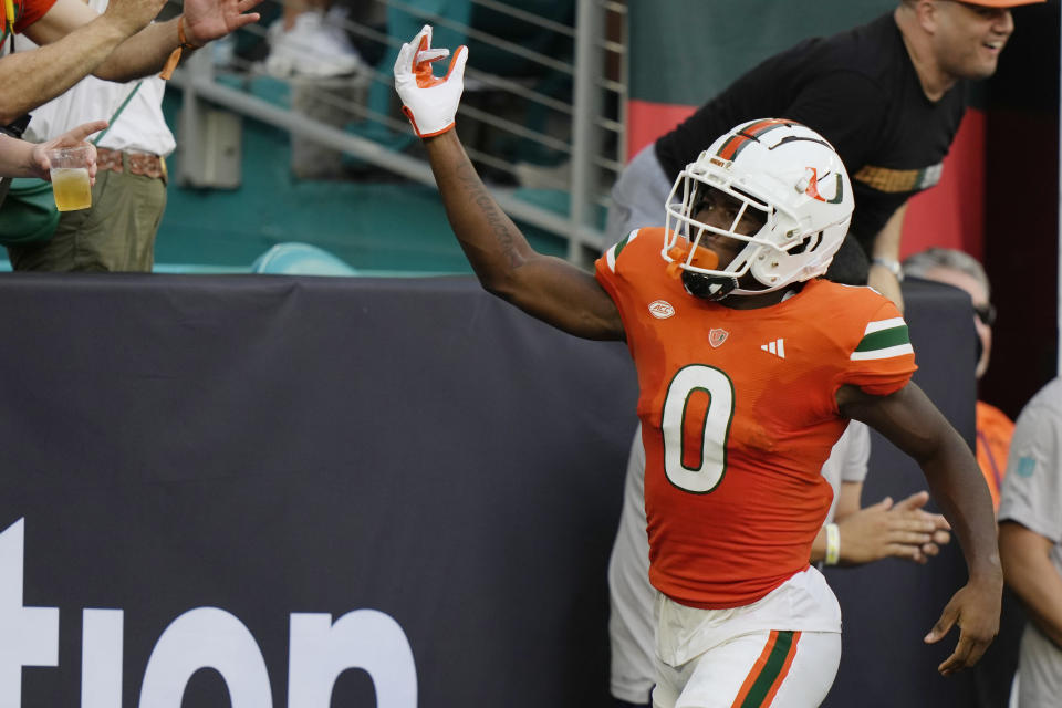 Miami wide receiver Brashard Smith (0) celebrates after scoring a touchdown during the second half of an NCAA college football game against Texas A&M, Saturday, Sept. 9, 2023, in Miami Gardens, Fla. (AP Photo/Lynne Sladky)