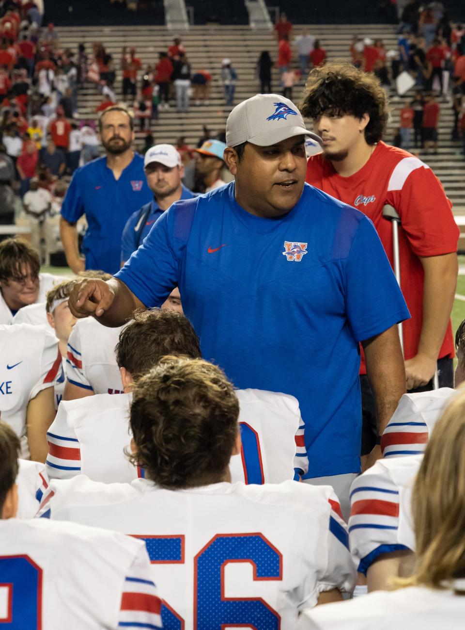 Westlake coach Tony Salazar tells his team that "you are champions" after the loss.