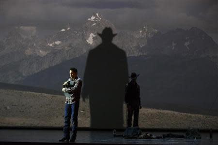 American tenor Tom Randle (Jack Twist) (L), and Canadian bass-baritone Daniel Okulitch (Ennis del Mar), perform during a dress rehearsal of the opera "Brokeback Mountain" at the Teatro Real in Madrid, January 24, 2014. REUTERS/Paul Hanna