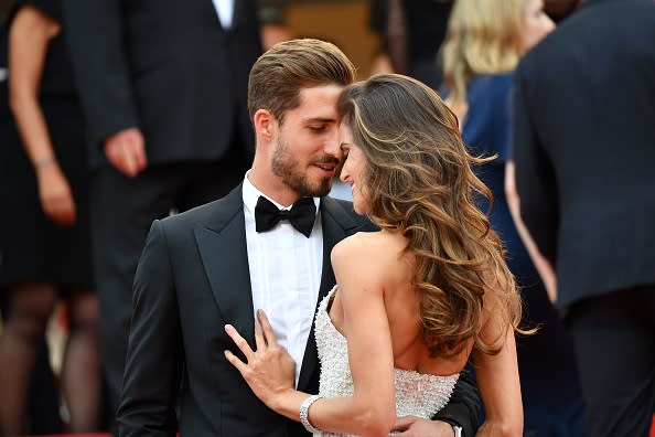 Brazilian model Izabel Goulart and German goalkeeper Kevin Trapp arrive on May 22, 2017 for the screening of the film 'The Killing of a Sacred Deer' at the 70th edition of the Cannes Film Festival in Cannes, southern France.
