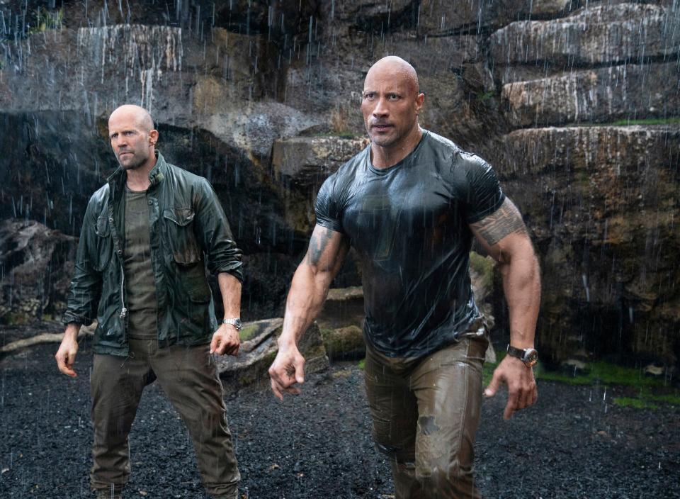 Deckard Shaw (Jason Statham, left) and Luke Hobbs (Dwayne Johnson) face a genetically enhanced villain in 