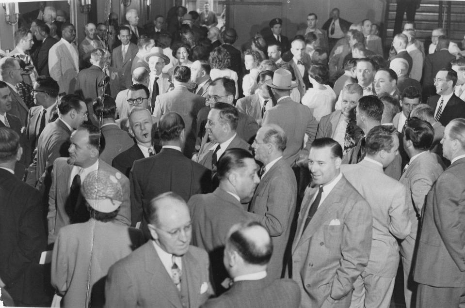 Delegates and spectators arrive in the lobby of Veterans Memorial Auditorium in Providence for the opening of the constitutional convention in 1951.
