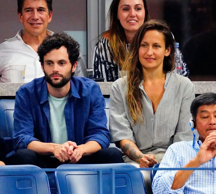 Penn and Domino sitting in the stands for a game