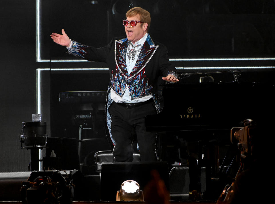 <p><a href="https://people.com/tag/elton-john/" rel="nofollow noopener" target="_blank" data-ylk="slk:Elton John;elm:context_link;itc:0;sec:content-canvas" class="link ">Elton John</a> dazzles in a shiny ensemble as he performs at Dodger Stadium in Los Angeles on Nov. 20 during a live Disney+ event. </p>