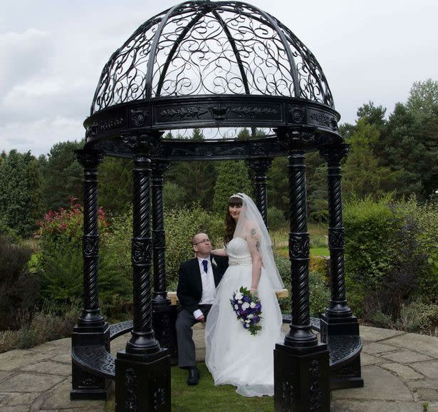 Paul Wheatley had mobility issues on his wedding day and had to watch his wife take romantic pictures with her bridesmaids in the mud instead. Photo: Caters