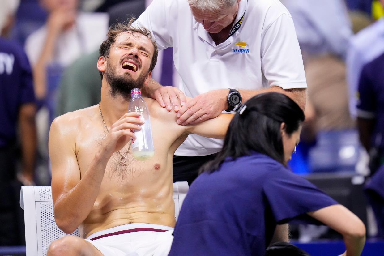 Daniil Medvedev, of Russia, reacts during a medical time out (AP)