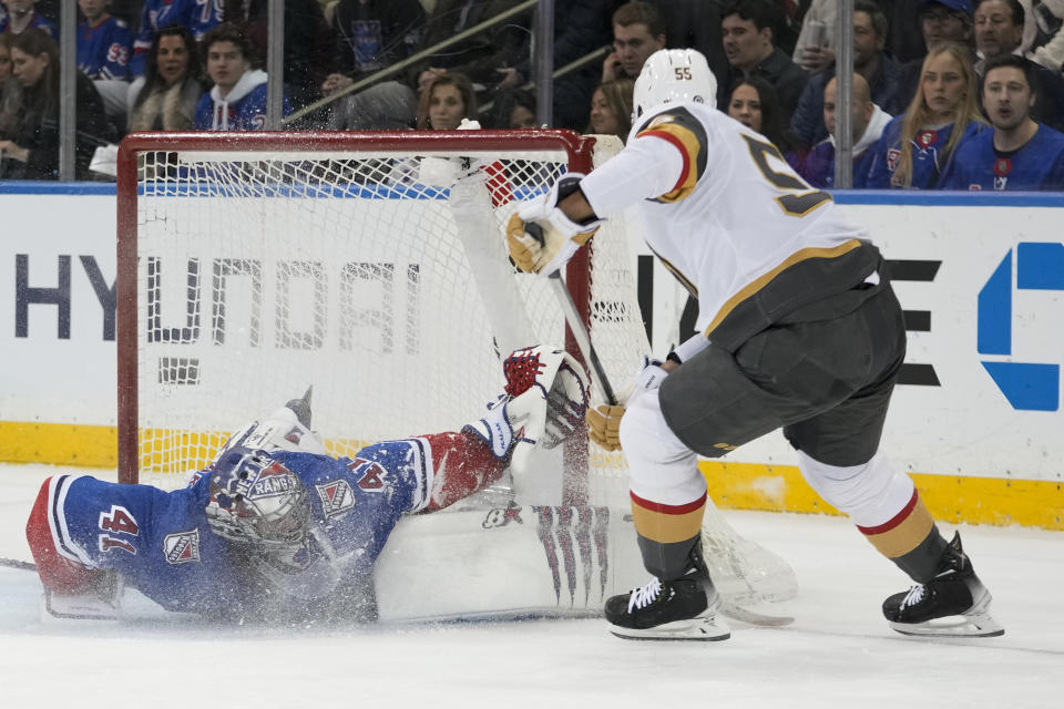 New York Rangers goaltender Jaroslav Halak (41) makes a save against Vegas Golden Knights right wing Keegan Kolesar (55) during the second period of an NHL hockey game Friday, Jan. 27, 2023, at Madison Square Garden in New York. (AP Photo/Mary Altaffer)