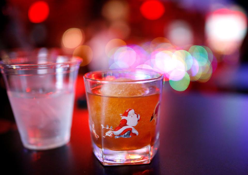 A Snowball Old Fashioned is pictured at the Ponyboy in Oklahoma City, Wednesday, Dec.7, 2022. The bar has convertex into a Christmas-themed pop-up bar, "Miracle on 23rd Street."