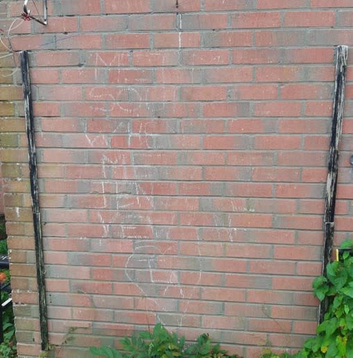 Chalk graffiti by Anthony Yewman on a wall at Jenny Dalton’s home (Hampshire Constabulary/PA)