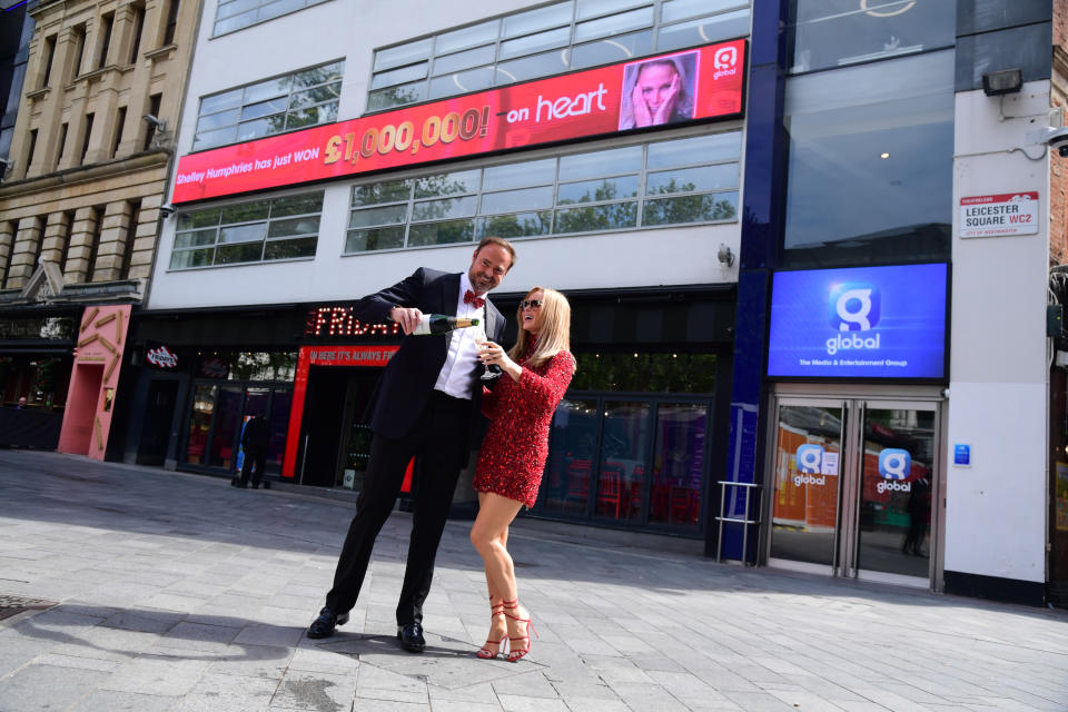 Radio presenters Jamie Theakston and Amanda Holden at the launch of Heart Radio's 'Make Me a Millionaire' competition, outside the Global Radio studios in Leicester Square, central London. Picture date: Friday May 28, 2021. (Photo by Ian West/PA Images via Getty Images)