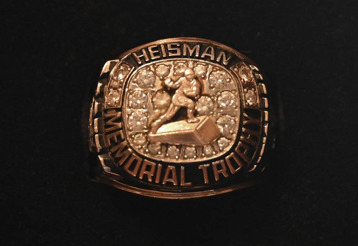 Former South Carolina Gamecocks running back and Heisman Trophy winner George Rogers Heisman Memorial Trophy ring is among Rogers’ mementos on Tuesday, May 23, 2023. Rogers won the Heisman in 1980.