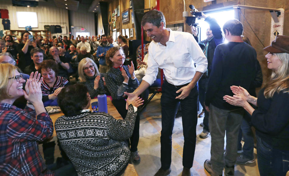 Former Texas congressman Beto O'Rourke shakes hands during a campaign stop at a brewery in Conway, N.H., Wednesday, March 20, 2019. O'Rourke announced last week that he'll seek the 2020 Democratic presidential nomination. (AP Photo/Charles Krupa)