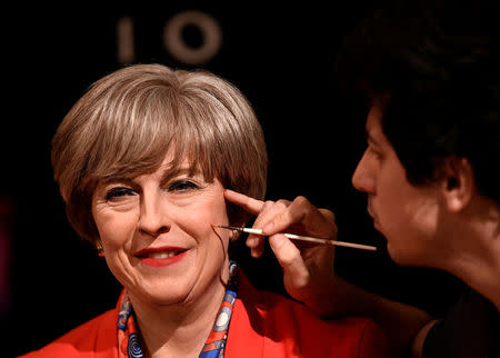 FILE PHOTO: Madame Tussauds unveils their new wax model of Britain's Prime Minister Theresa May in London, November 8, 2017. REUTERS/Dylan Martinez/File Photo