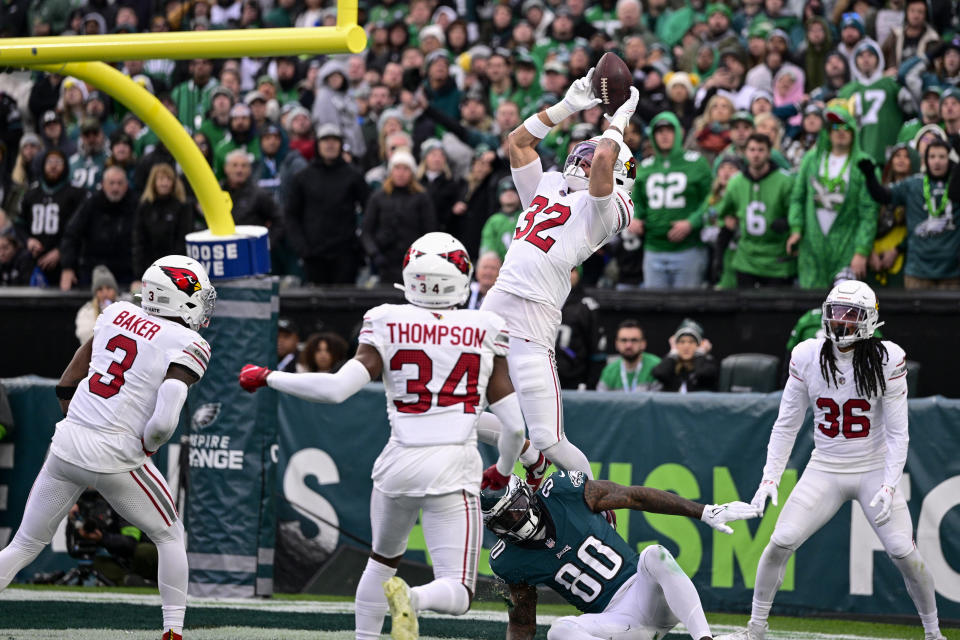 Arizona Cardinals safety Joey Blount (32) intercepts a pass by Philadelphia Eagles quarterback Jalen Hurts on a Hail Mary attempt late in the second half of an NFL football game, Sunday, Dec. 31, 2023, in Philadelphia. The Cardinals won 35-31. (AP Photo/Derik Hamilton)