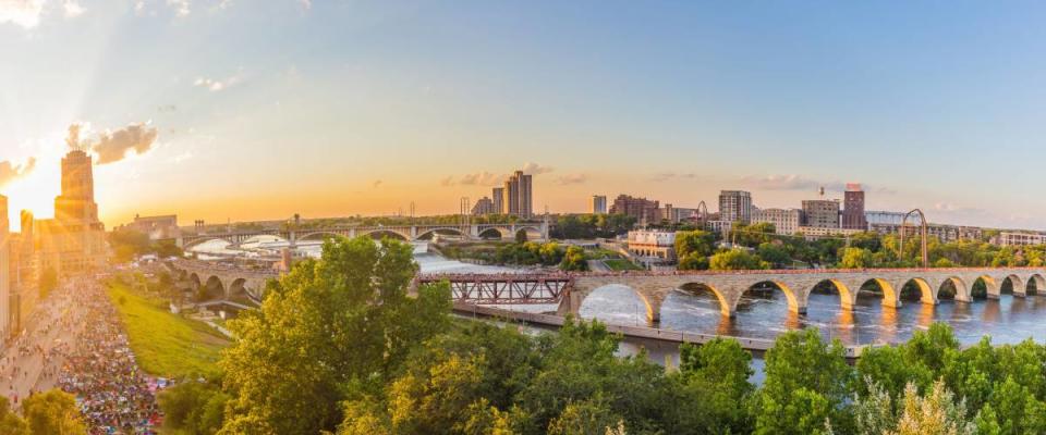 Minneapolis, Minnesota at sunset on the Mississippi river.