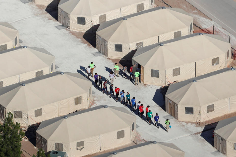 Immigrant children, many of whom have been separated from their parents, are housed in tents next to the Mexican border in Tornillo, Texas, June 2018. (Photo: Mike Blake/Reuters)