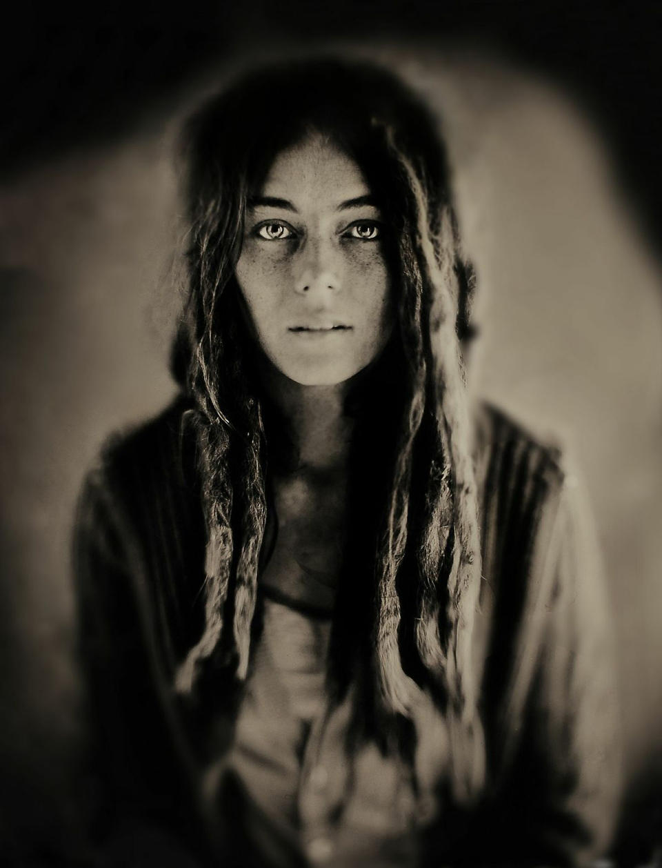 This 2011 photo provided by Studio Q shows "Kyleigh, Boulder, Colorado," in a wet plate collodion image made by Quinn Jacobson. Wet plate collodion photography, invented in 1851, has experienced a resurge in recent years as photographers turn to this antiquated method for its moody, even haunting, images. "The aesthetic is kind of a half-remembered dream," says Jacobson, a Denver photographer. (AP Photo/ Studio Q, Quinn Jacobson)