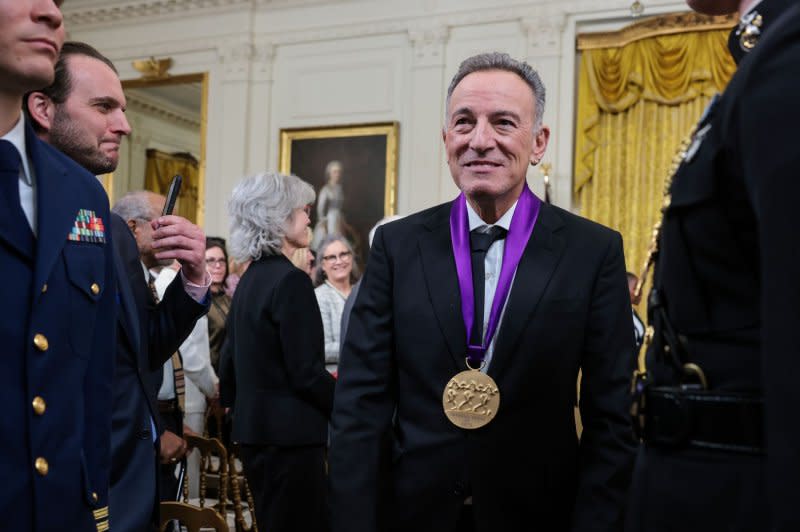 Bruce Springsteen walks off the stage after an event with President Joe Biden for the Arts and Humanities Award Ceremony in The East Room of The White House in Washington, on March 21, 2023. File Photo by Oliver Contreras/UPI