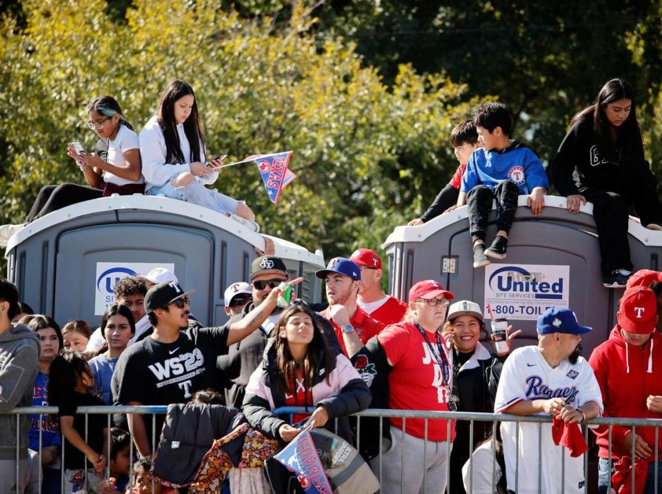 Fans found some unusual places to watch the Texas Rangers World Series Parade in Arlington, Texas, Friday, Nov. 03, 2023. (Special to the Star-Telegram Bob Booth)