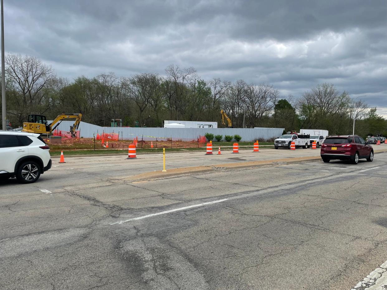 Cars pass by construction on natural gas lines at a property owned by Ameren Illinois on North University Street Wednesday, April 17, 2024. Ameren will be upgrading their natural gas infrastructure in North Peoria into the summer months.