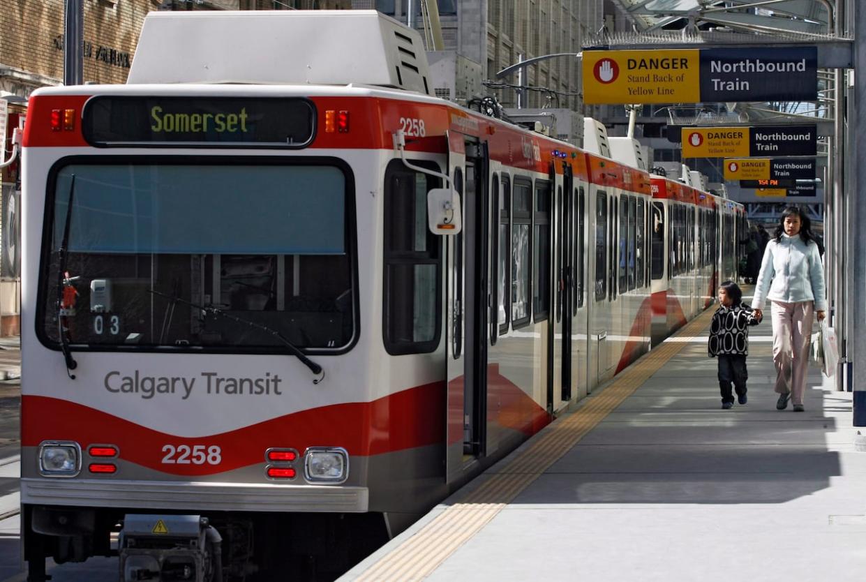 If the program is cut, it could dramatically increase the amount low-income Calgarians pay for transit fares. (Jeff McIntosh/The Canadian Press - image credit)