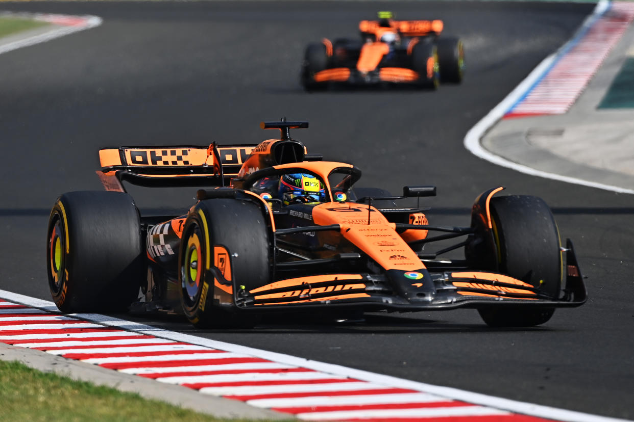 BUDAPEST, HUNGARY - JULY 21: Oscar Piastri of Australia driving the (81) McLaren MCL38 Mercedes leads Lando Norris of Great Britain driving the (4) McLaren MCL38 Mercedes on track during the F1 Grand Prix of Hungary at Hungaroring on July 21, 2024 in Budapest, Hungary. (Photo by James Sutton - Formula 1/Formula 1 via Getty Images)