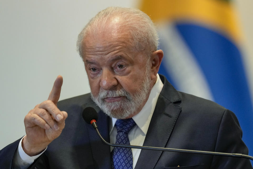 Brazilian President Luiz Inacio Lula da Silva answers a question during a press conference after attending the South American Summit at Itamaraty palace in Brasilia, Brazil, Tuesday, May 30, 2023. South America's leaders are gathering as part of Lula's attempt to reinvigorate regional integration efforts. (AP Photo/Andre Penner)