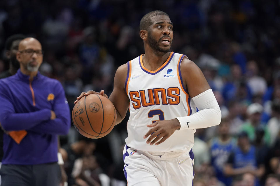 Phoenix Suns guard Chris Paul (3) moves the ball up court against the Dallas Mavericks during the first half of Game 6 of an NBA basketball second-round playoff series, Thursday, May 12, 2022, in Dallas. (AP Photo/Tony Gutierrez)